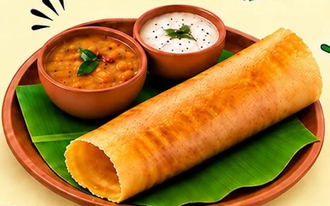 Golden masala dosa with sambar and chutney